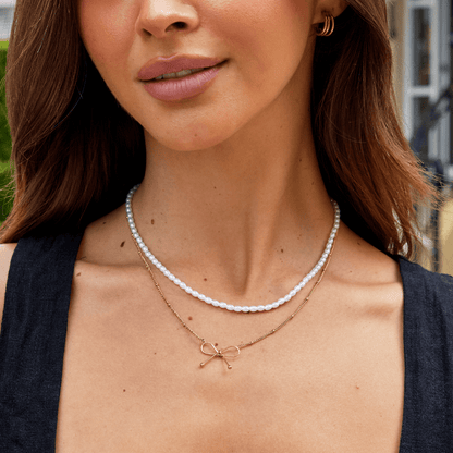 Anika Gold Bow Necklace